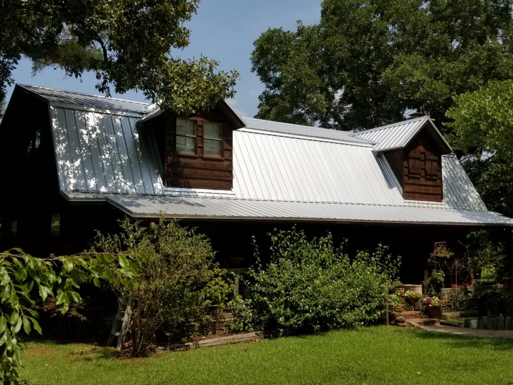 Max Rib metal roof panels on a country home.