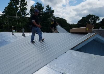 A tin roof that is durable, strong, low maintenance, and can be walked on.