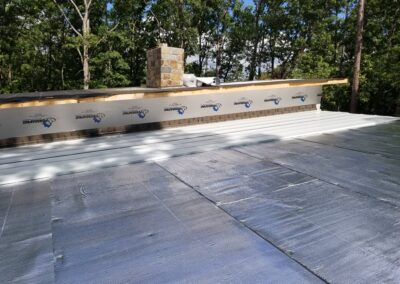 Insulation and underlayment for metal roofing.