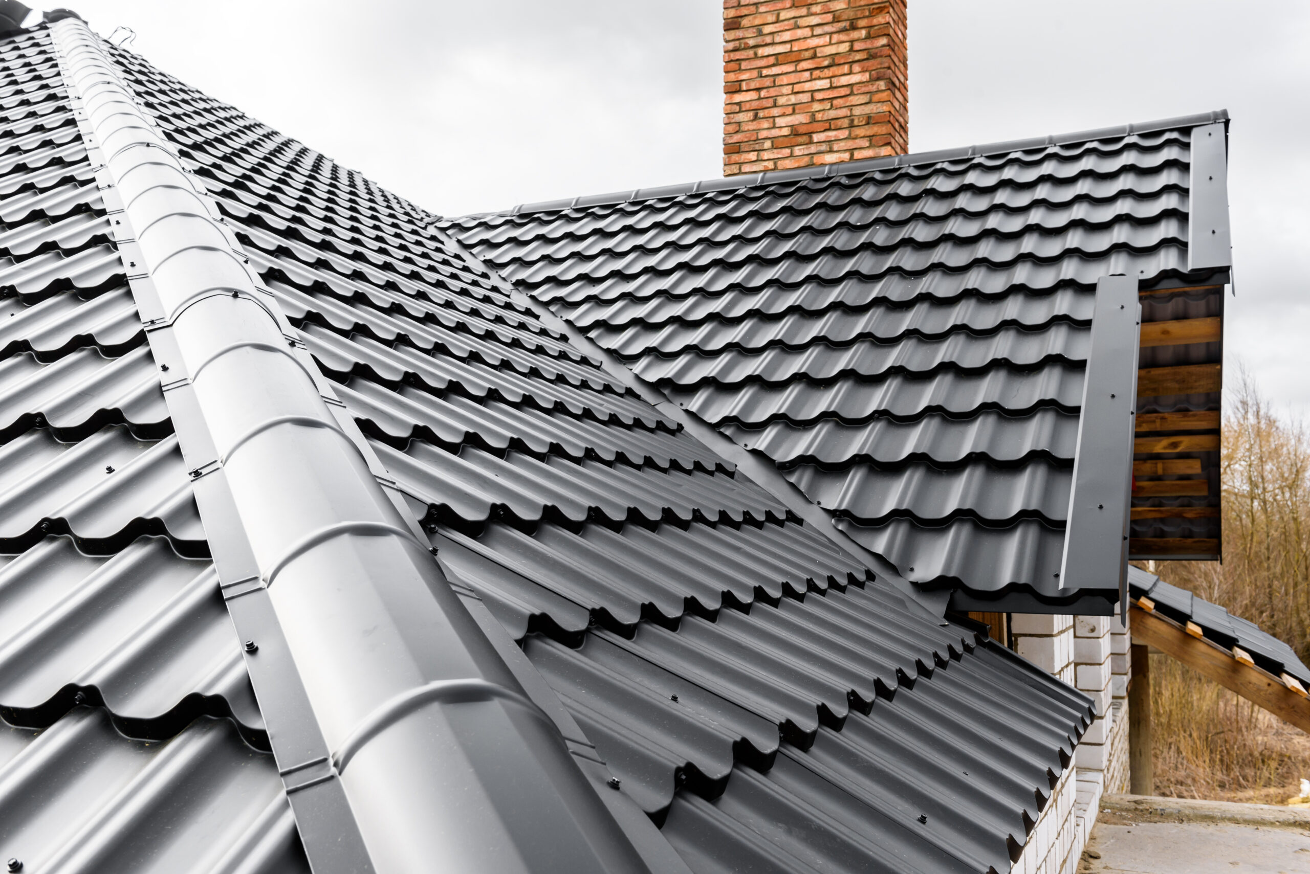 Metal Roofs vs. Wooden Shake Shingles: Which One is Better in the Long Term?